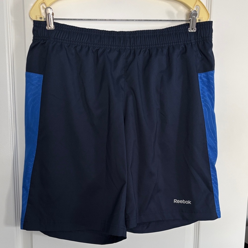 NWOT Reebok Men’s Navy Athletic Shorts with Royal Blue Side Panels